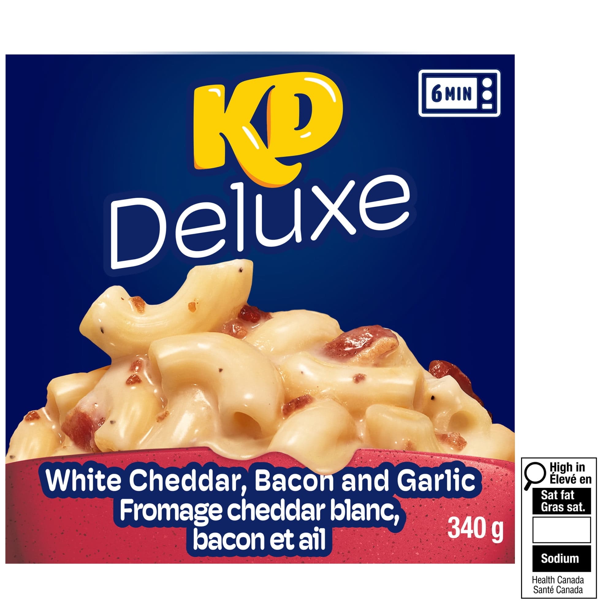 Kraft Dinner Macaroni et fromage au cheddar blanc bacon ail deluxe surgelé 340 g